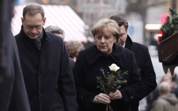 Chancellor Merkel Visits Site of Deadly Attacks in Berlin