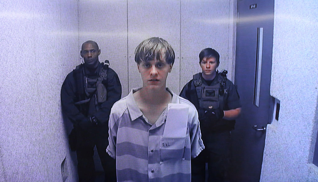 In this image from the video uplink from the detention center to the courtroom, Dylann Roof appears at Centralized Bond Hearing Court in North Charleston, South Carolina, on June 19, 2015. (Grace Beahm-Pool/Getty Images)