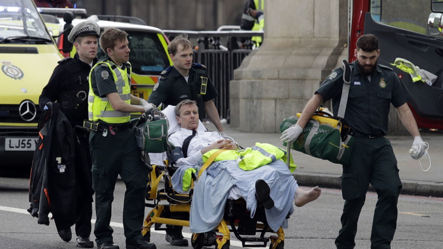 Officer stabbed and pedestrians ran over in London “terrorist incident”