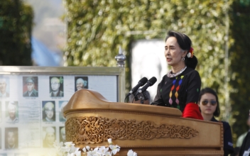 Suu Kyi acknowledges lack of progress after one year in office