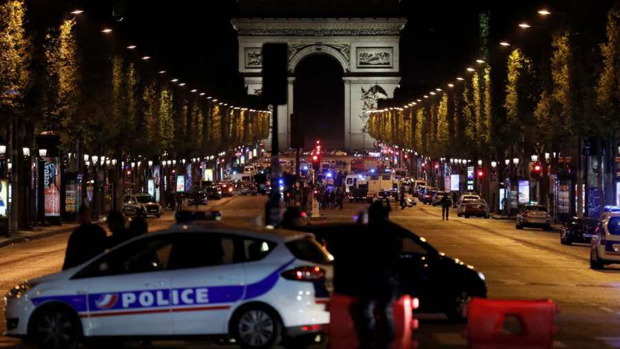 Attacker, police officers dead, wounded in Paris attack