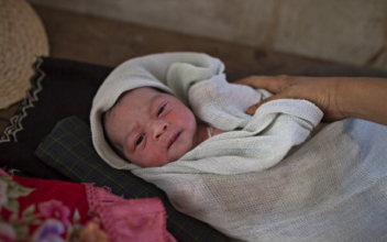 Burma turns to midwives to lower infant mortality