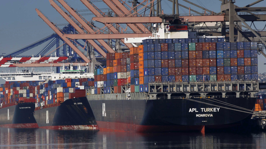 Drop in cell phone imports cuts February trade deficit almost ten percent