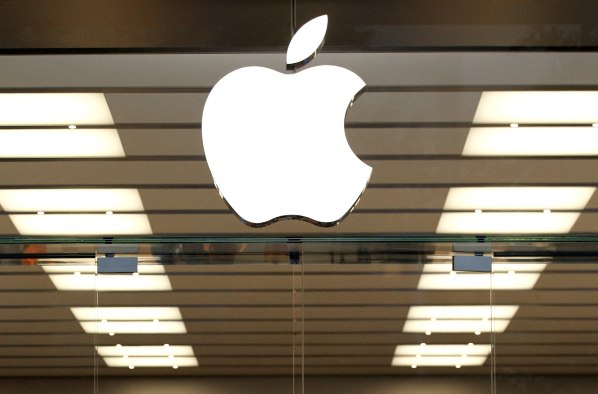 A file photo shows the Apple logo above a store location entrance, in Dallas on Sept. 19, 2013. (Tony Gutierrez/AP File Photo)