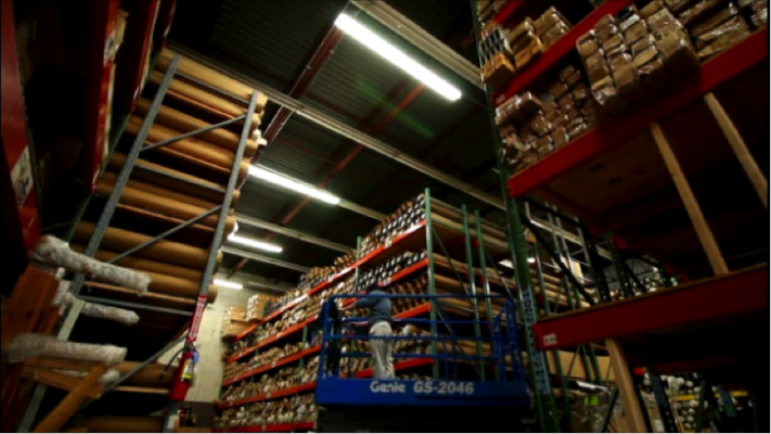 IoT system installed in a warehouse in New York. Mk1 Radar Sensor detects motions and triggers D1X Driver to light up even before the arrival.