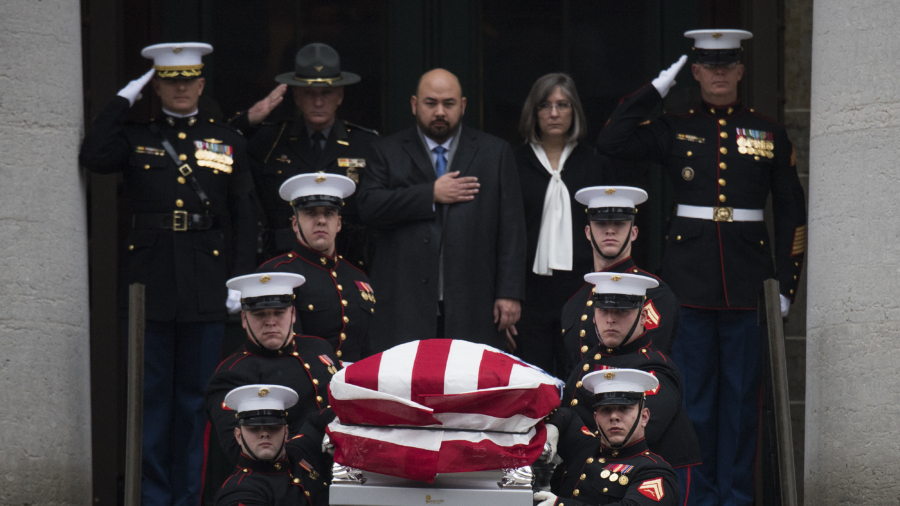Pioneer astronaut John Glenn laid to rest at Arlington National Cemetery