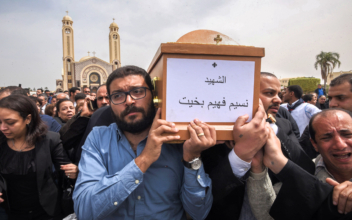 Egypt’s Coptic Church bombing victims buried