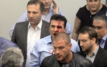 Macedonia parliament breaks out in violence after Albanian speaker election
