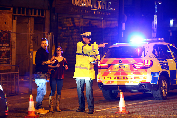Police stand by a cordoned off street close to the Manchester Arena in Manchester, England on May 22, 2017. (Dave Thompson/Getty Images)