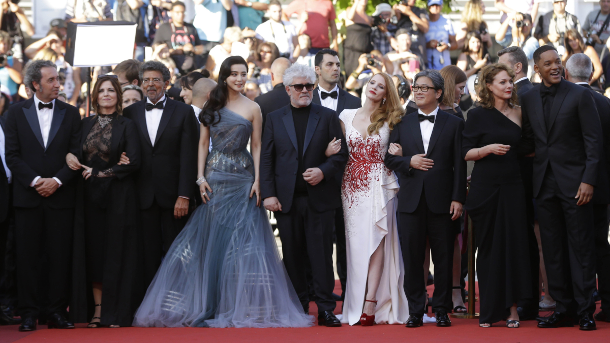 Jury members Paolo Sorrentino, from left, Agnès Jaoui, Gabriel Yared, Fan Bingbing, Pedro Almodovar, Jessica Chastain, Park Chan-wook, Maren Ade and Will Smith pose for photographers upon arrival at the award ceremony at the 70th international film festival, Cannes, southern France, on May 28, 2017. (Alastair Grant/AP Photo)