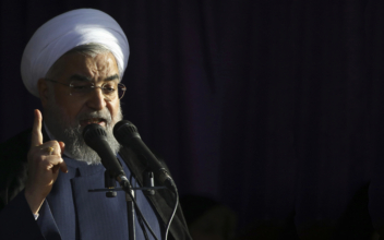 Iran’s Rouhani easily wins re-election