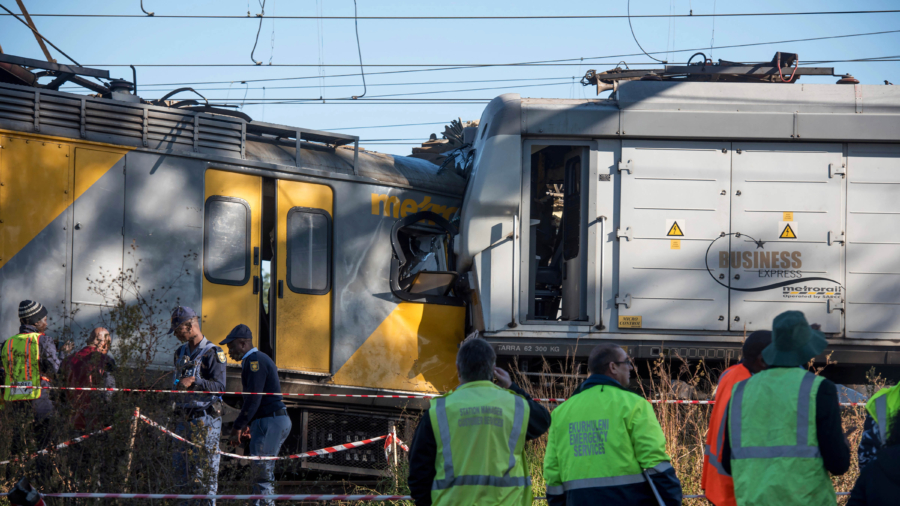 Trains collide in South Africa station, one driver killed