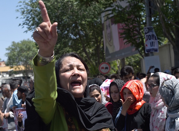 Afghanistan bomb blasts rock funeral for protest victim