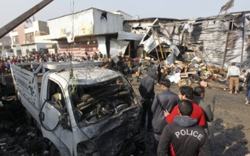 Female suicide bomber kills dozens in Iraq
