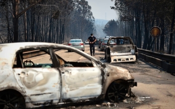 Portugal wildfires kill 57 so far