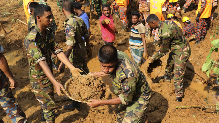140 killed by Bangladesh mudslide; rescuers dig for survivors