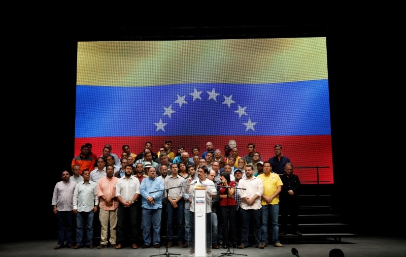 Venezuela opposition turns heat up on Maduro with strike call