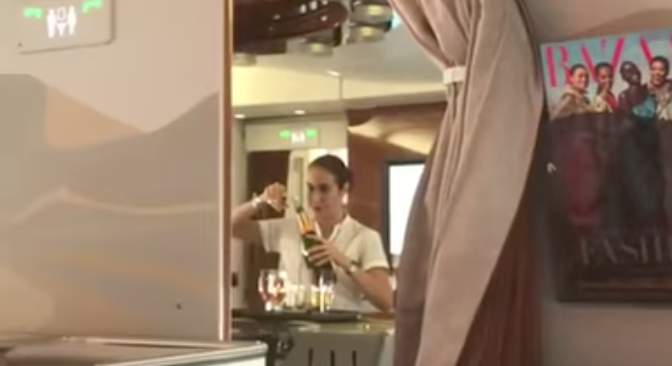 Emirates Air stewardess filmed pouring Champagne back into bottle in first class