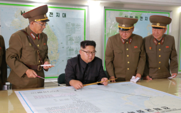 North Korea’s Kim Backs Away From Guam Missile Plan