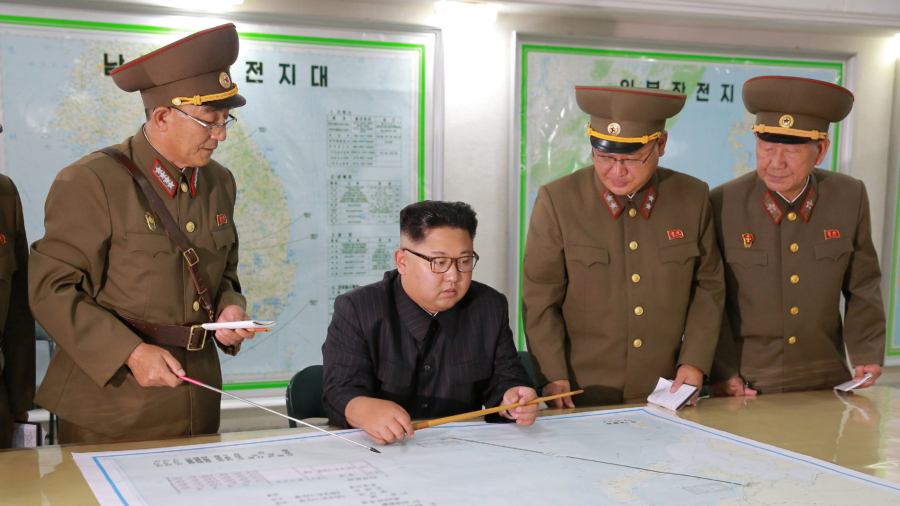 North Korea’s Kim Backs Away From Guam Missile Plan