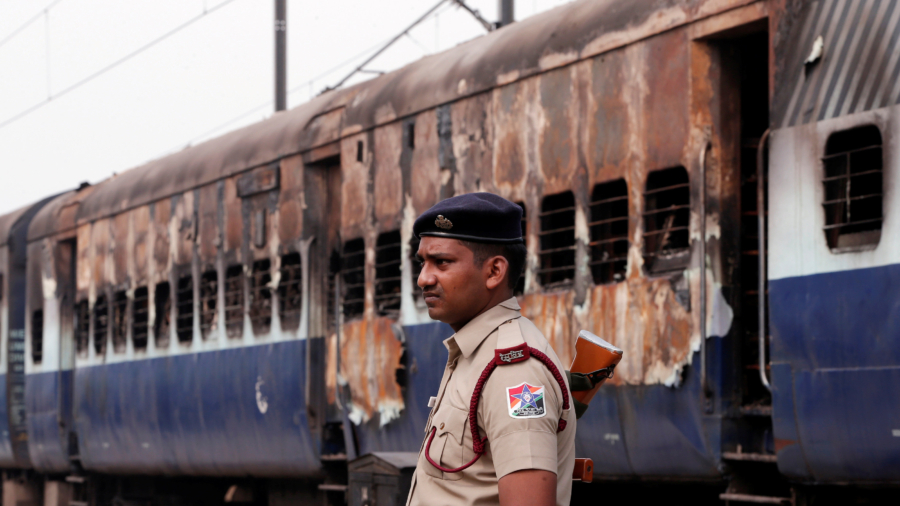 India detains hundreds, cancels more than 300 trains after deadly ‘godman’ protests