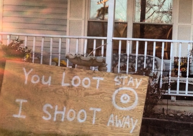 Signs Of A Disaster Seen in Texas: ‘You Loot, We Shoot’