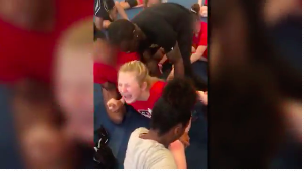 Cheerleading Head Coach Fired From High School for Forcing Girls Into The Splits