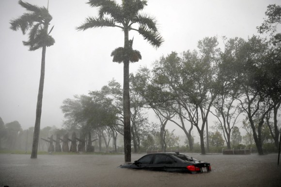 A partially submerged car at a flooded area in Coconut Grove as Hurricane Irma arrives at south Florida, in Miami, Fla., Sept. 10, 2017. (Carlos Barria/Reuters)