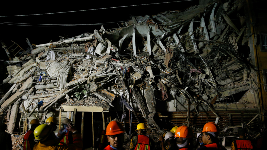 Desperate Night Search in Mexico School, Other Ruins as Quake Killed More Than 200