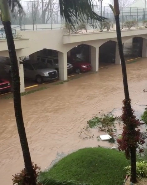 A flooded road is seen as Hurricane Maria hits Suan Juan, Puerto Rico on Sept. 20, 2017. (Gabriel Rosa/via REUTERS)