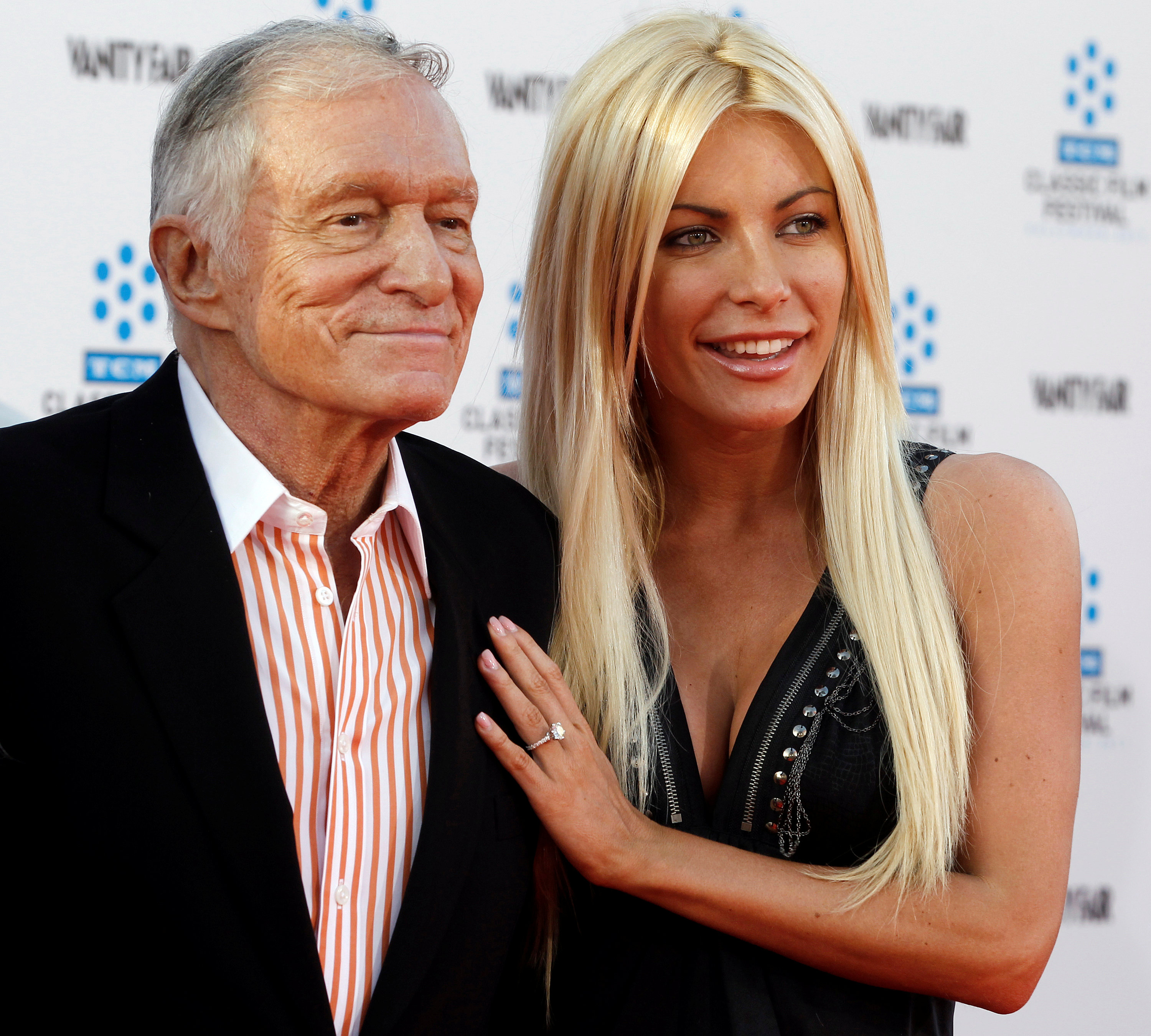 In this file photo, Hugh Hefner and his fiancee, Playboy Playmate Crystal Harris, arrive at the opening night gala of the 2011 TCM Classic Film Festival featuring a screening of a restoration of 'An American In Paris' in Hollywood, California April 28, 2011. (REUTERS/Fred Prouser/File Photo)