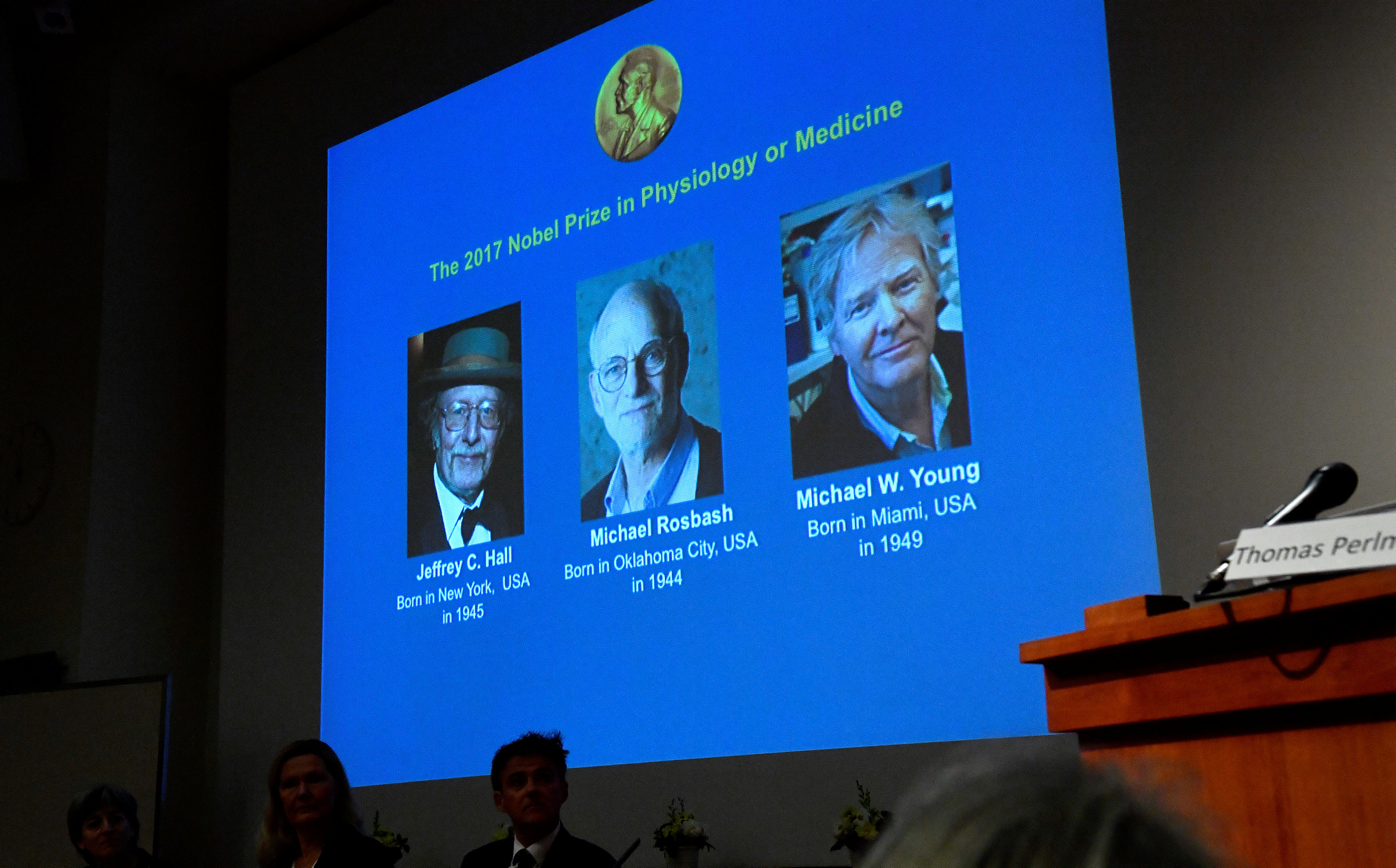 The names of Jeffrey C. Hall, Michael Rosbash and Michael W. Young are displayed during a news conference to announce the winner of the Nobel Prize in Physiology or Medicine 2017, in Stockholm, Sweden October 2, 2017. (TT News Agency/Jonas Ekstromer via REUTERS)