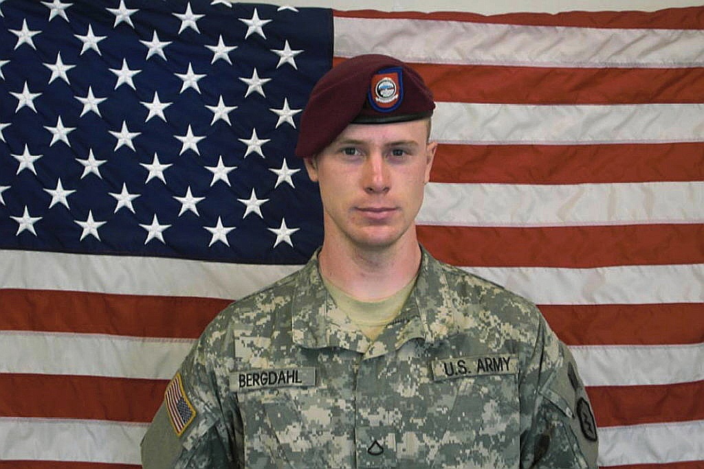 Sgt. Bowe Bergdahl poses in front of an American flag. (U.S. Army via Getty Images)