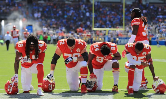 College Football Player Cut From Team After Kneeling for Anthem