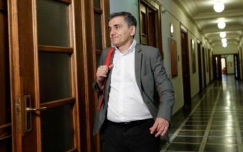 Greece, Lenders Reach Deal on Reforms Under Bailout Review