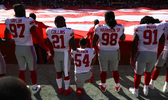At Least 20 Players Protest During Anthem After NFL Agrees to Fund Player Activism