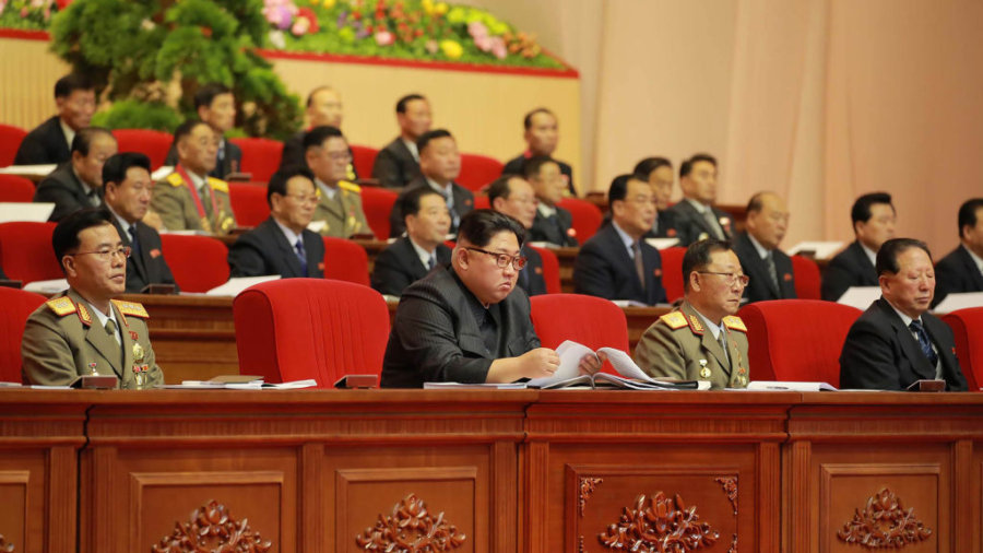 North Korea’s Kim Jong Un Fetes Rocket Scientists, Promises More Weapons