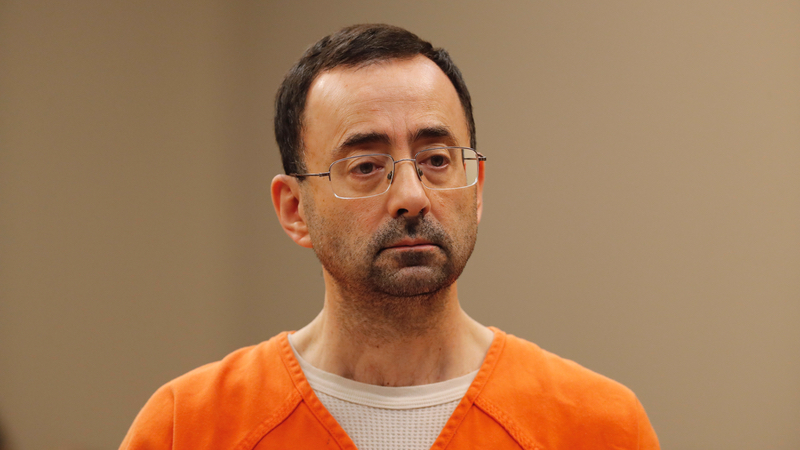 In this Nov. 22, 2017, file photo, Dr. Larry Nassar, appears in court for a plea hearing in Lansing, Mich. (AP Photo/Paul Sancya, File)
