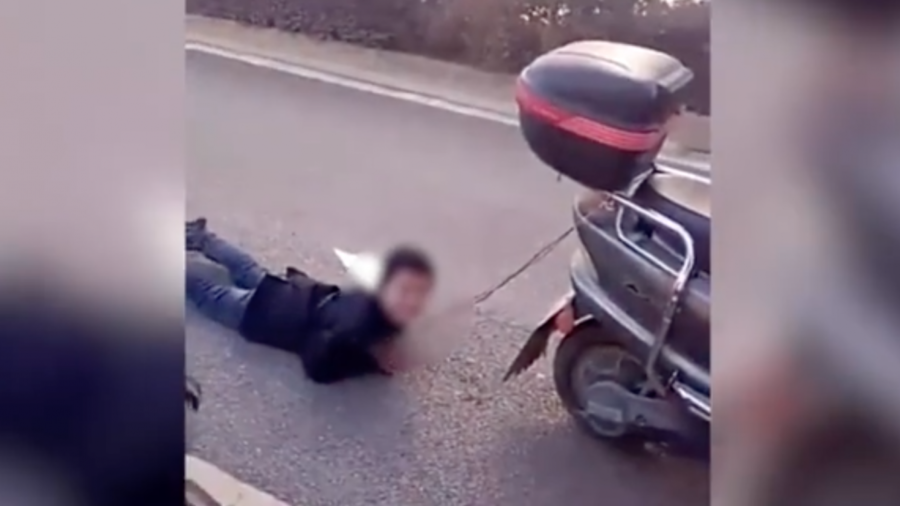 Chinese Mother Allegedly Drags Son By Hands Behind Scooter as Punishment