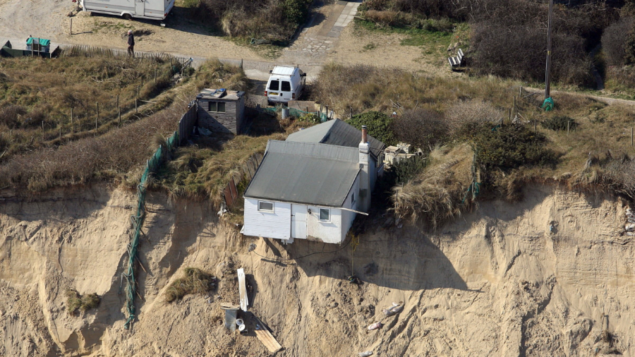 Jaw-Dropping Drone Footage Shows Homes Teetering on Cliff Edge After ...
