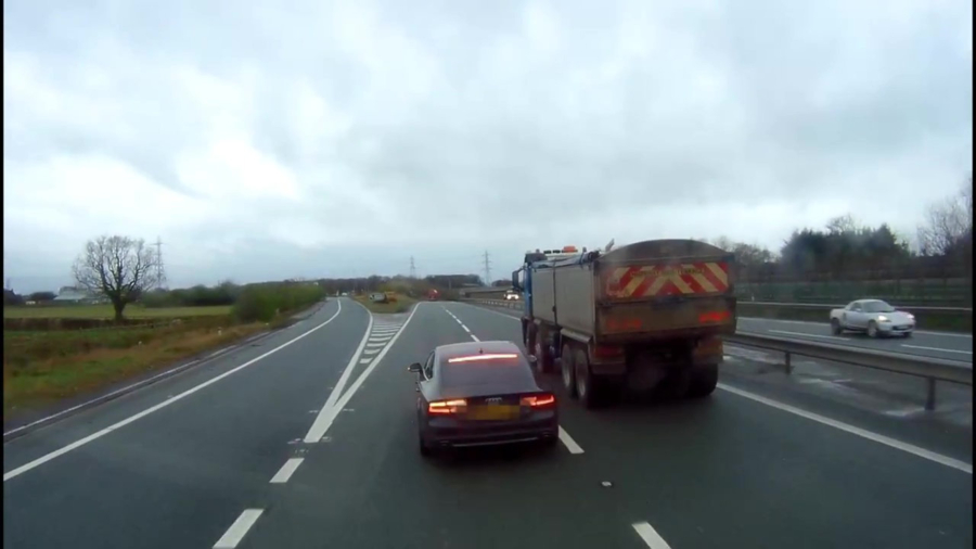 Dash-Cam Footage Shows Near Miss Between Undertaking Road Rage Driver and Lorry