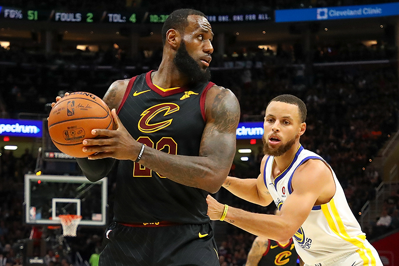 LeBron James is defended by Stephen Curry #30 of the Golden State Warriors during Game Four of the 2018 NBA Finals, June 8, 2018. (Gregory Shamus/Getty Images)
