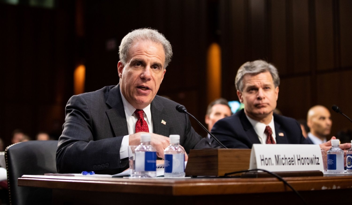 Michael Horowitz (L), Inspector General at the Department of Justice and FBI Director Christopher Wray at a Senate hearing in Washington on June 18, 2018. (Samira Bouaou/The Epoch Times)