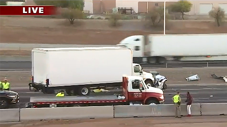 A truck slammed into a line of stopped cars, causing a chain reaction. (Screenshot via Fox 10-Phoenix)