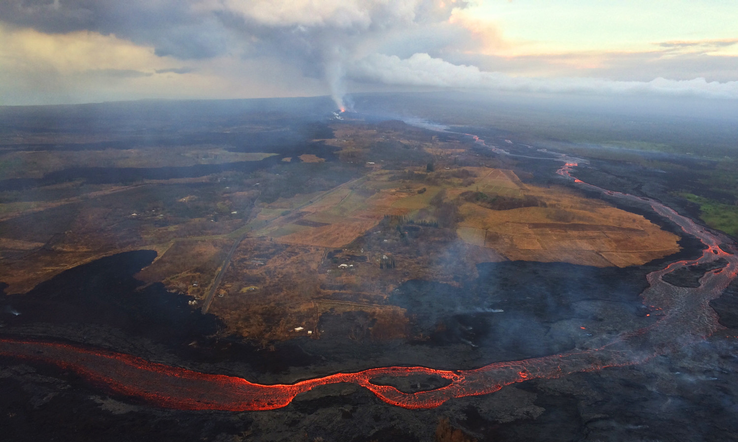 This aerial view of Kīlauea Volcano's lower East Rift Zone taken during an Hawaii Volcano Observatory's early morning overflight on July 17, 2018. (USGS)