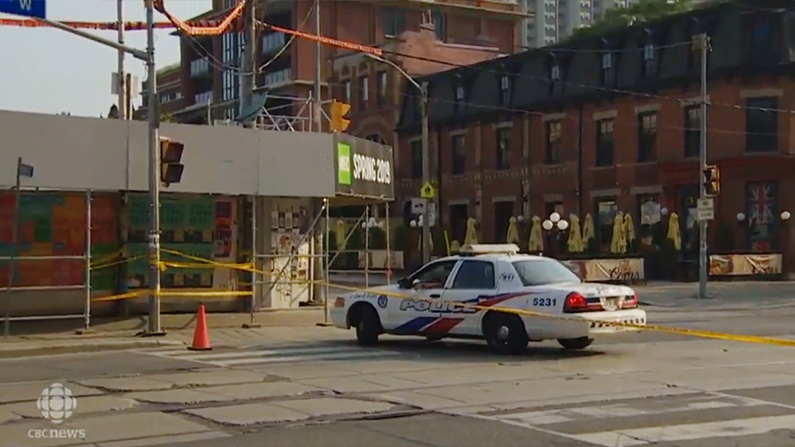 Police sealed off part of Queen Street West after the shooting,. (CBC screenshot)