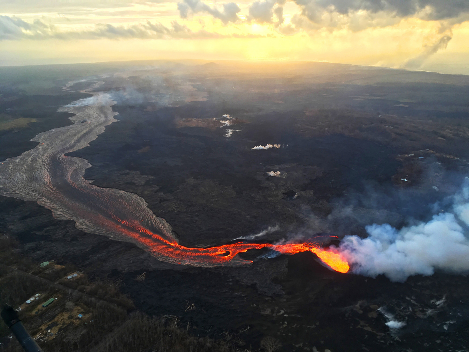 USGS scientists captured this image of sunrise above Kīlauea's lower East Rift Zone, on July 17, 2018. (USGS)