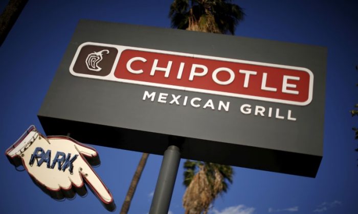 Ohio health officials say they’ve received 368 reports of people getting sick stemming from a Chipotle restaurant in Sawmill Parkway in Powell. Signage for a Chipotle Mexican Grill is seen in Los Angeles on April 25, 2016. (Reuters/Lucy Nicholson)