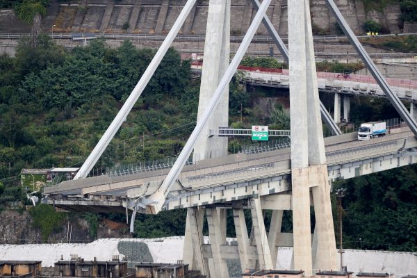 The collapsed Morandi Bridge is seen in the Italian port city of Genoa, Italy. (Reuters/Stefano Rellandini)