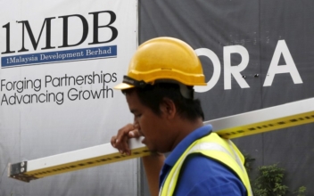 Malaysian Financier Wanted in 1MDB Probe Says He Will Not Surrender